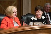 Chairman Suasn Collins and Ranking Member Claire McCaskill share a laugh at the last hearing in which they share leadership of the committee.